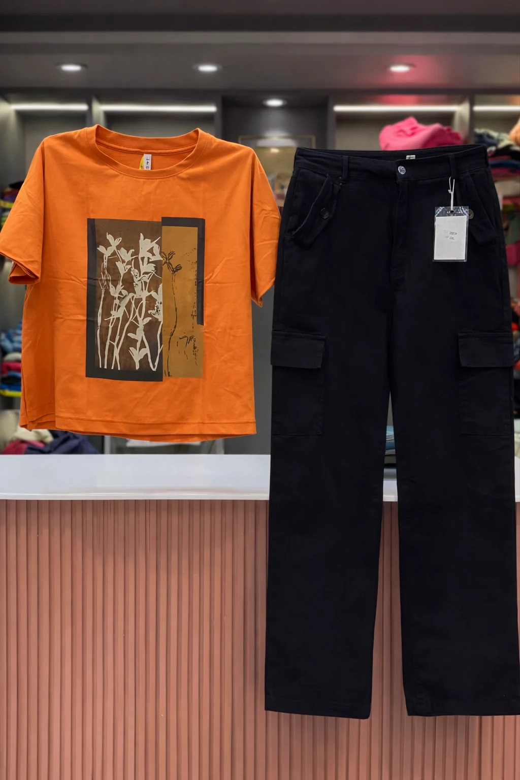 Women Orange Graphic T-Shirt with Black Cargo Pant Combo Set